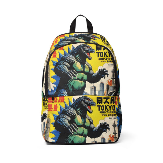 A Godzilla backpack featuring a repeating graphic print of Godzilla in Tokyo, with a bright yellow background, Japanese text, and cityscape details. The backpack has black straps and trim, and is shown against a plain white background.